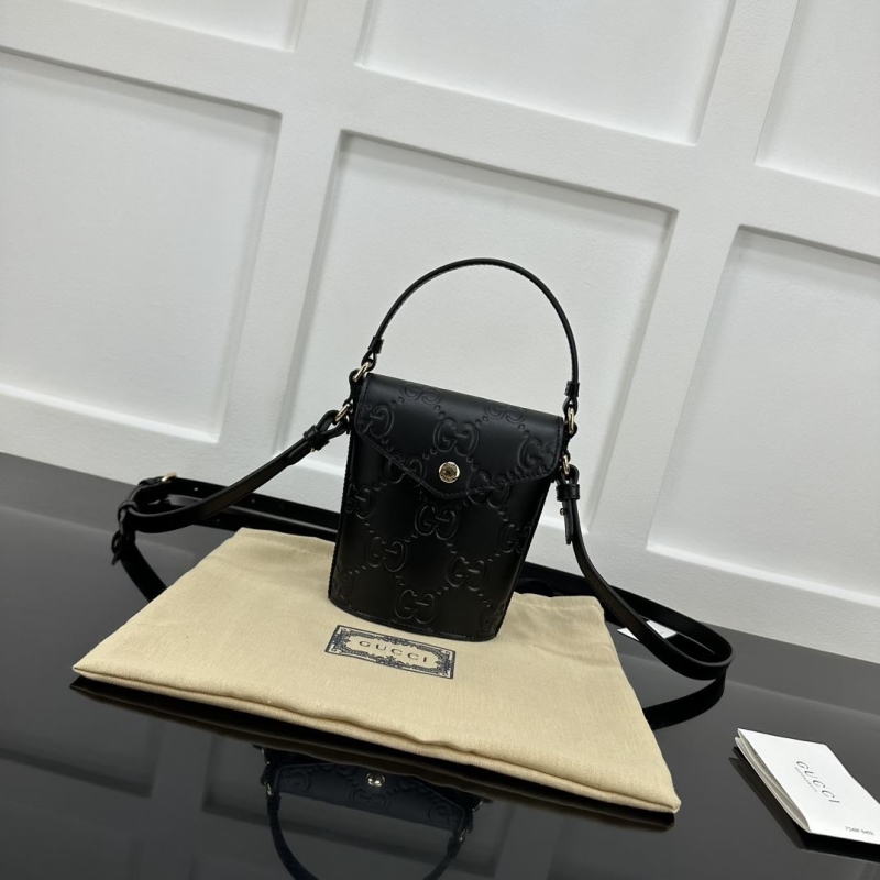 G*u*i top handle bags